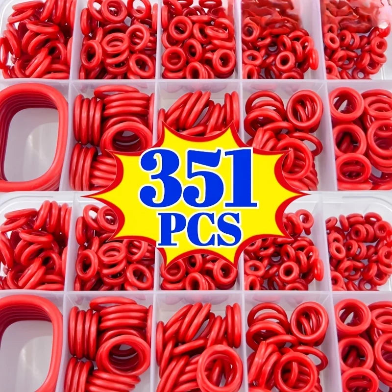 A collection of red silicone O-rings in various sizes packaged in clear plastic compartments.