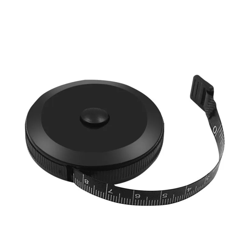 A black portable tape measure and ruler set with a flexible measuring tape.