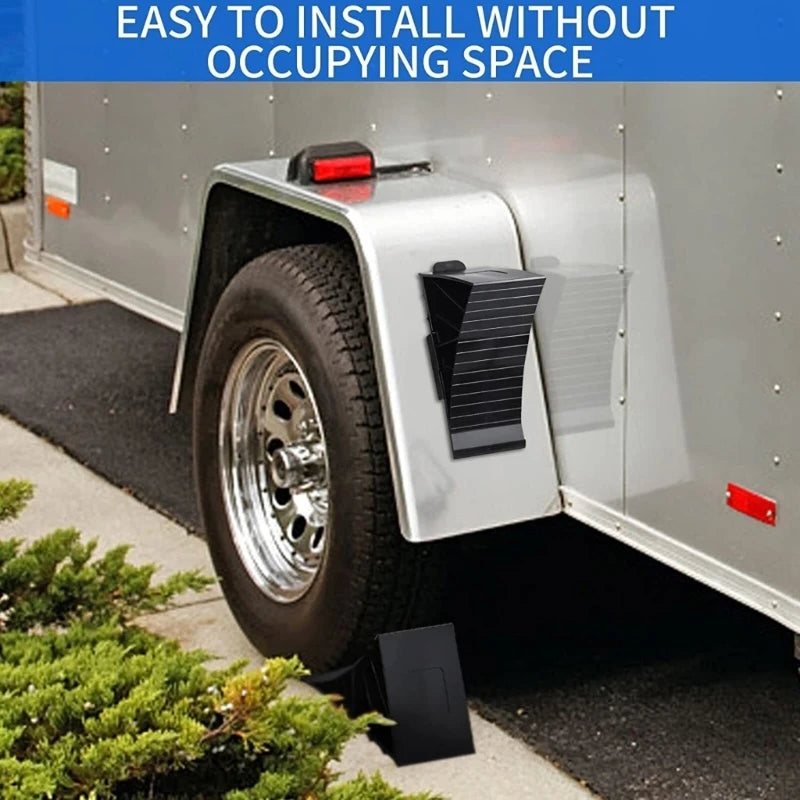 A silver vehicle with a tire chock installed on the fender, demonstrating easy installation without occupying space.