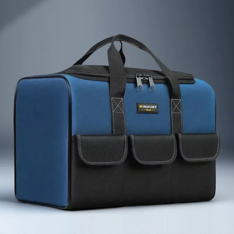 A dark blue and black heavy duty multi-compartment tool organizer bag with padded compartments.