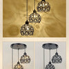 A set of crystal LED chandelier lamps hanging from the ceiling in a warm, golden light effect diagram.
