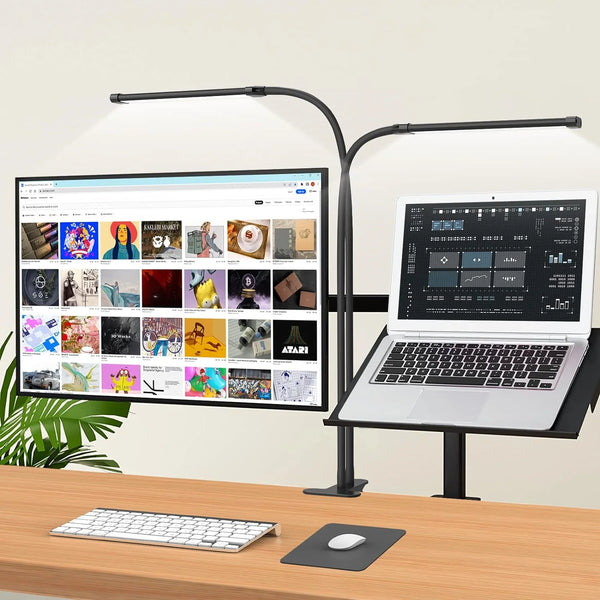 An RGB auto-dimming LED monitor light bar is positioned above a laptop on a wooden desk.