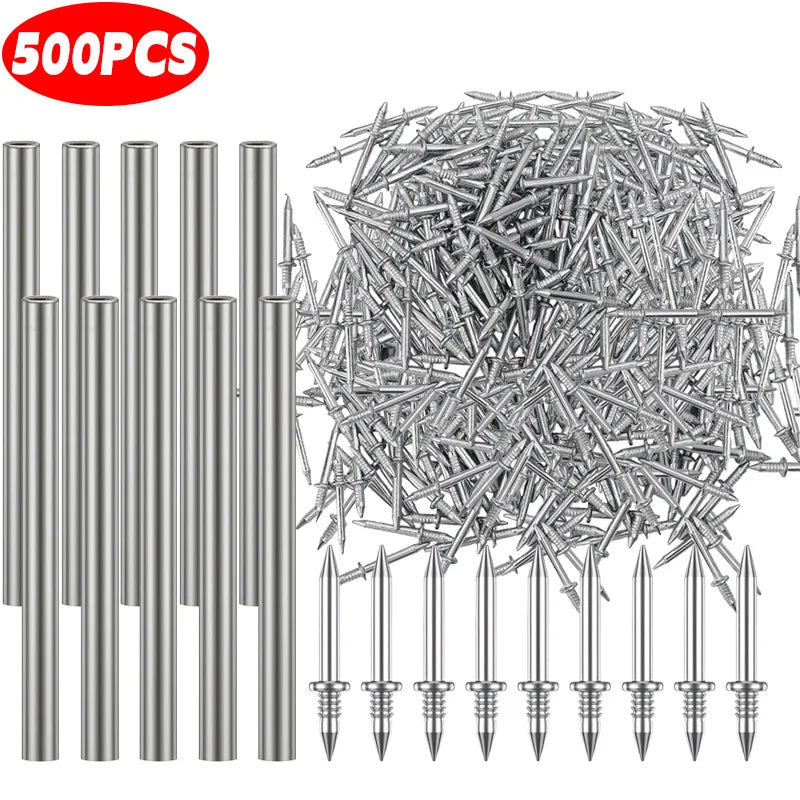 A pile of double-head nails for wood and furniture installation, showing various sizes and types.