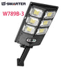 An E-SMARTER W789B-3 solar powered LED motion sensor outdoor garden light with four integrated lights.