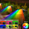 A solar landscape spotlight illuminates a colorful beam onto greenery, demonstrating six fixed color modes.