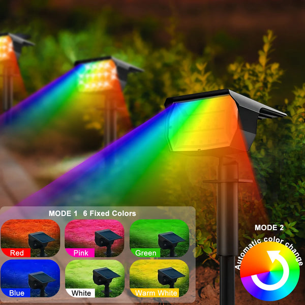 A solar landscape spotlight illuminates a colorful beam onto greenery, demonstrating six fixed color modes.