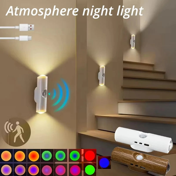 A smart motion sensor RGB night light illuminating a staircase and wall in a home setting.