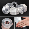 Rolls of clear acrylic double-sided adhesive tape stacked and being applied to a surface.