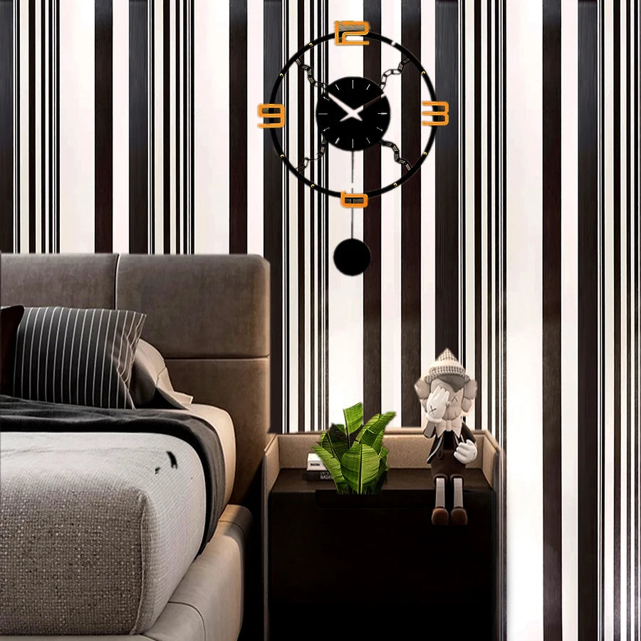 A modern living room interior featuring a dark sofa, vertical black and white striped walls, and a minimalist wall clock.