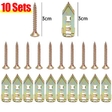 A set of 10 self-drilling drywall anchors in various sizes and finishes shown next to a scale.