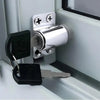 A silver sliding door window lock set with a black padlock and key is shown mounted on a white frame.