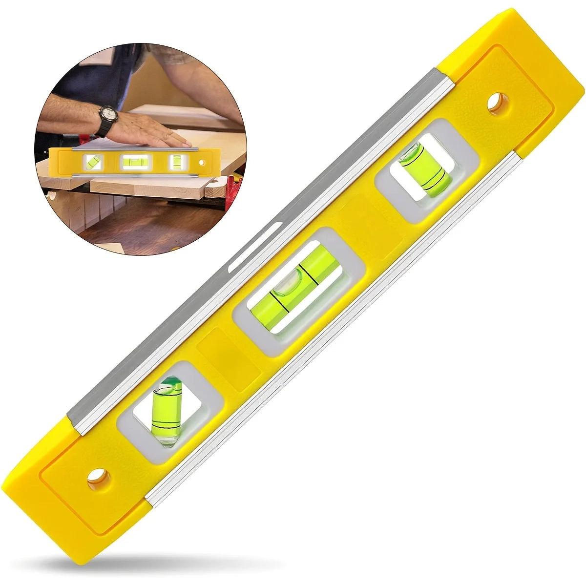 A yellow precision magnetic box level with multiple illuminated levels shown in a close-up view.