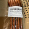 A set of natural wooden spoons and forks packaged in clear plastic for cooking