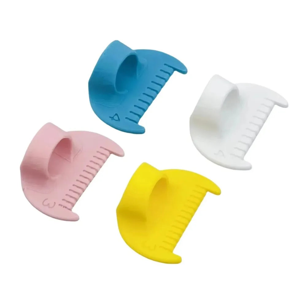 A set of four plastic sewing stencils in blue, pink, white, and yellow for edge locking stitch practice.