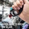 A hand holds a black tactical foldable shear tool demonstrating its ability to break glass.