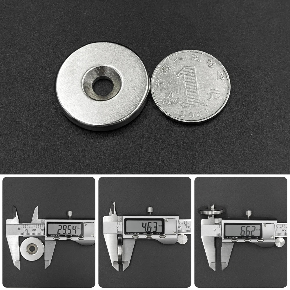 Three precision disc countersunk hole magnets are shown against a dark background.