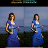 A woman wearing a blue dress holds a glass of water with a light blue glow, demonstrating bi-colour temperature adjustment.