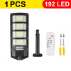 A black outdoor wall light fixture with 192 LEDs and a separate sensor unit and mounting screws.