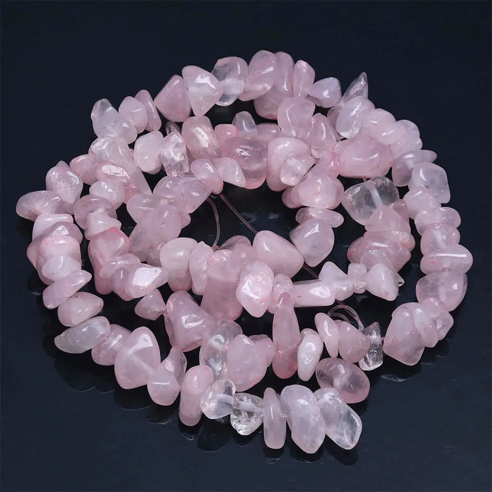 A circular arrangement of pink and clear natural agate beads for DIY jewelry making