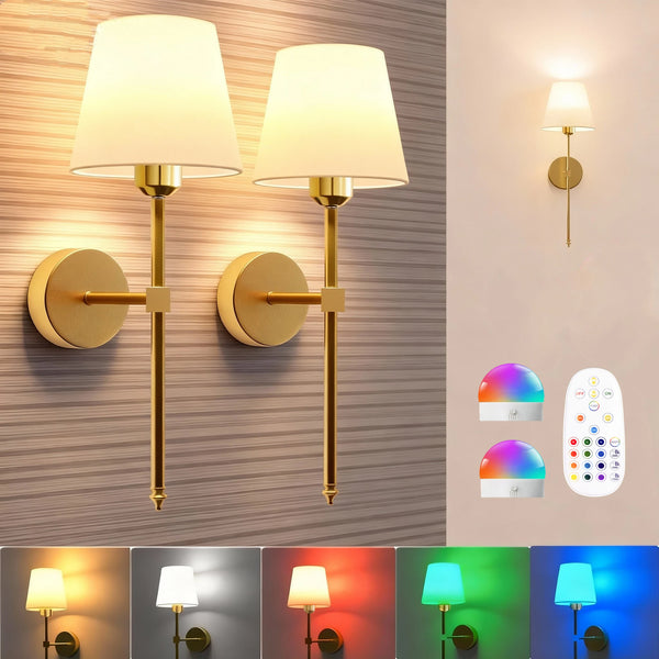 A pair of modern brass wall sconces with white shades and remote controls mounted on a textured wall.