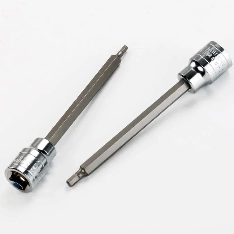 A precision hex socket bit set for drill and repair showing a long metal bit with a hexagonal tip and a threaded end.