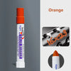 Orange solid paint marker pen with an orange cap and white body shown next to a swatch of orange color.