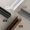 Various colors of flexible PVC door draft stoppers or weather strips shown in a flat lay arrangement.