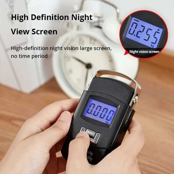 A hand holds a black portable digital luggage scale with a precision hook, displaying a weight of 0.000 kg.