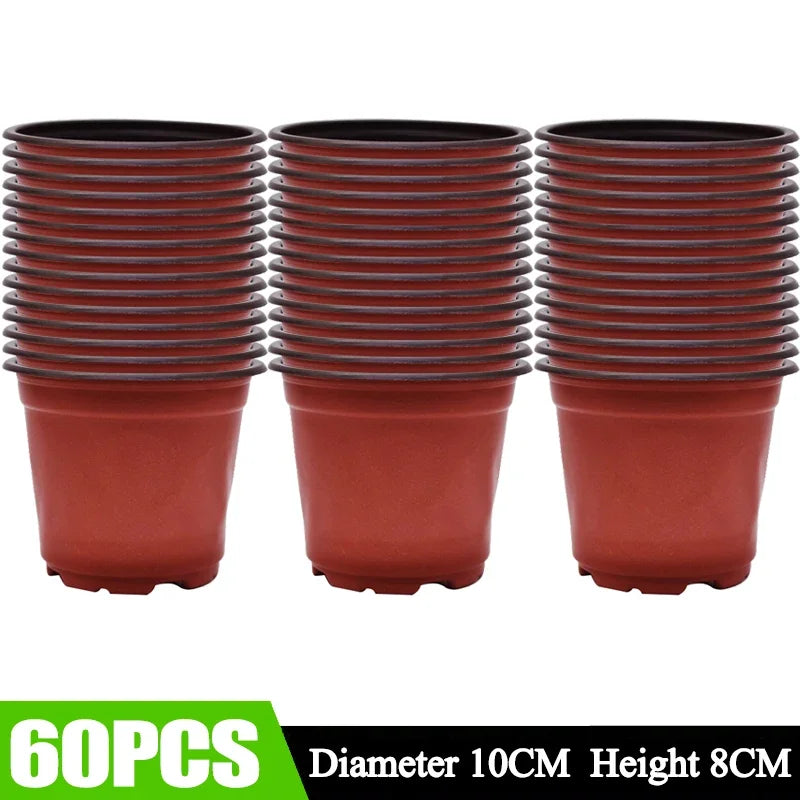 Sixteen terracotta-colored plastic nursery pots with black rims, 60 pieces total.