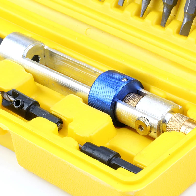 A set of multi-function countersunk drill bit screwdriver bits stored in a yellow plastic case.