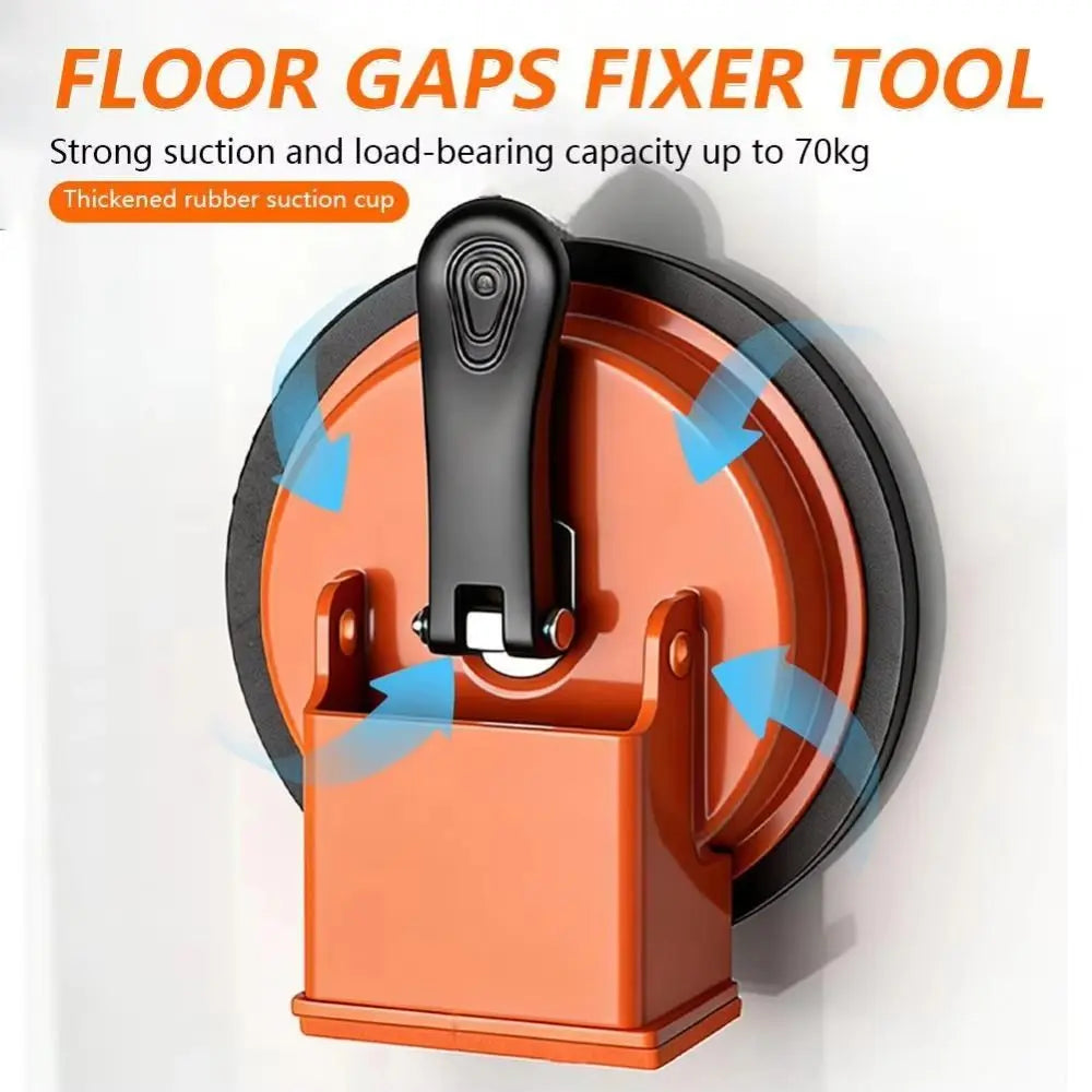 An orange floor gaps fixer tool with a black suction cup mechanism shown against a white background.