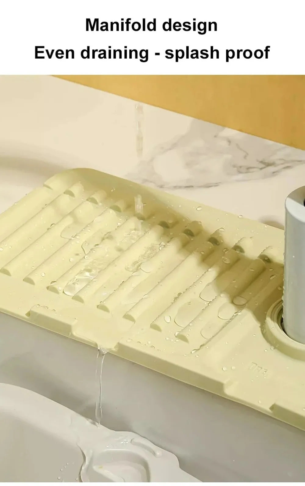 A yellow silicone drain mat with a manifold design is shown draining water into a sink.
