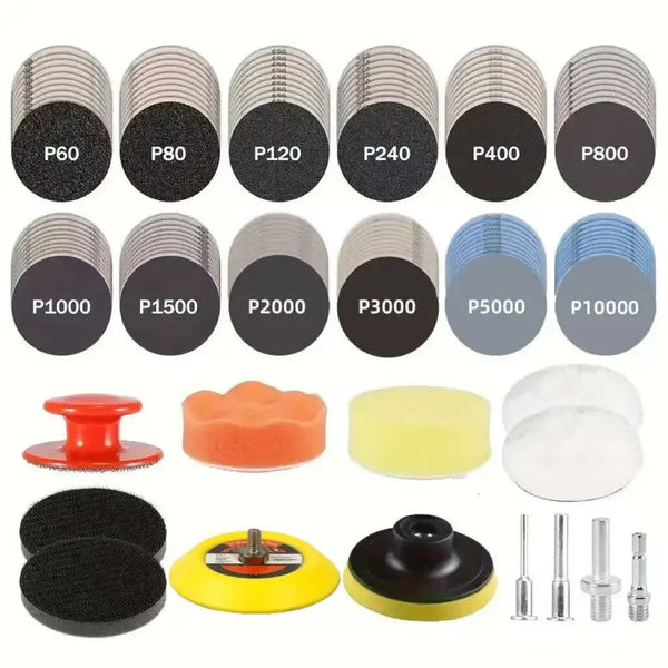 A collection of precision sanding discs and accessories including various grit sizes and mounting components.