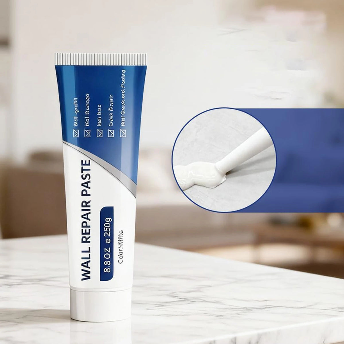 A tube of Wall Repair Paste for drywall repair is shown on a white marble surface.