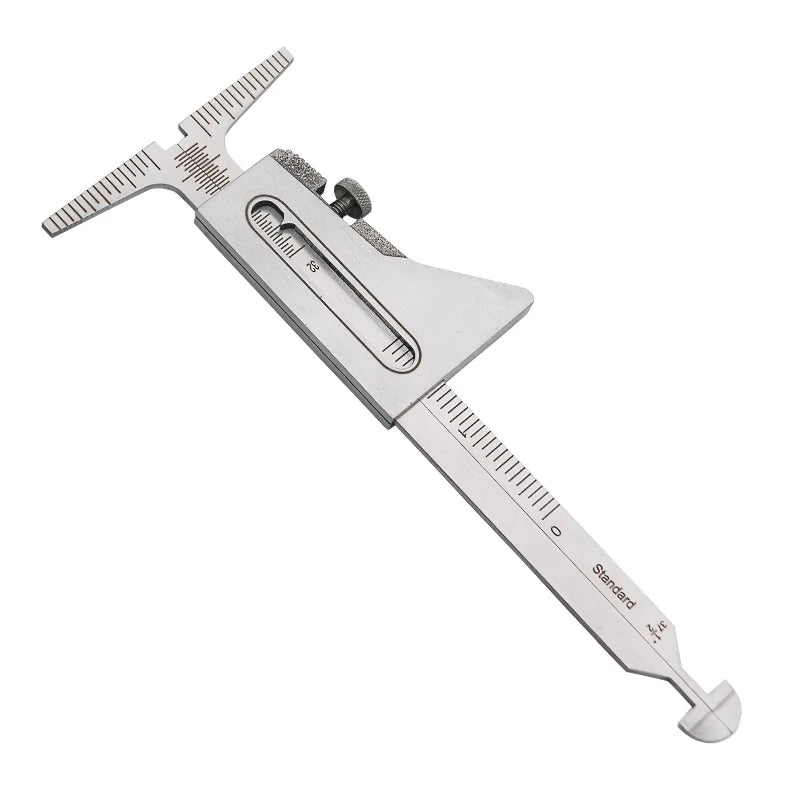 A silver precision welding gauge used for pipe alignment, showing a graduated scale and adjustment mechanism.