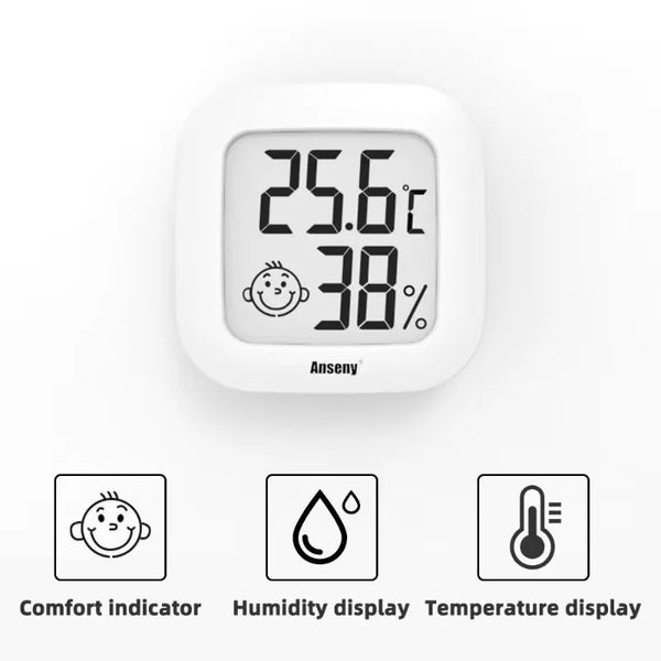 Termómetro y higrómetro digital blanco mostrando 25.6°C y 38% de humedad