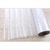 Roll of white frosted window privacy film with a diamond pattern shown on a wooden surface