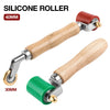 A silicone roller tool with a wooden handle and metal mechanism, showing two sizes 40mm and 30mm.