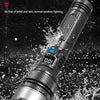 A silver and black outdoor waterproof flashlight is shown being used in a wet environment.