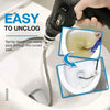 A hand uses a heavy duty spring sewer cleaning tool to unclog a toilet pipe.