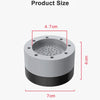 Top view of a round, silver silicone feet pad with a central hole and mounting features.