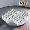 A set of 6x2 precision refrigerator magnets, 300 pieces, arranged on a marble surface.