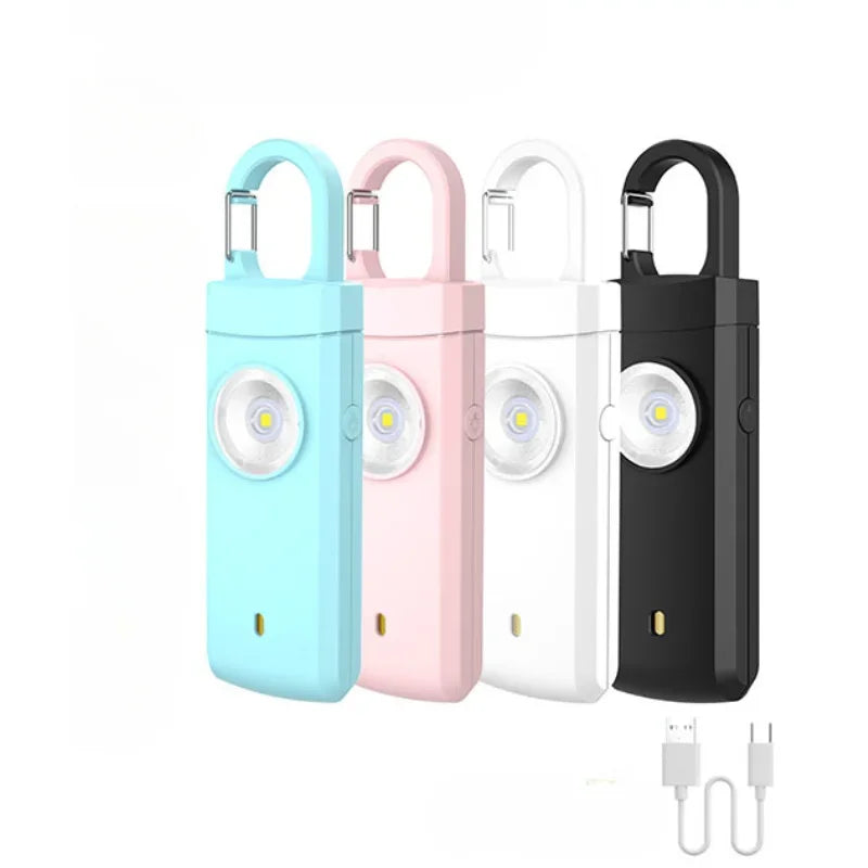 Un set de cinq torches LED à clés USB pour la self-défense, dans différentes couleurs : bleu clair, rose, blanc et noir.