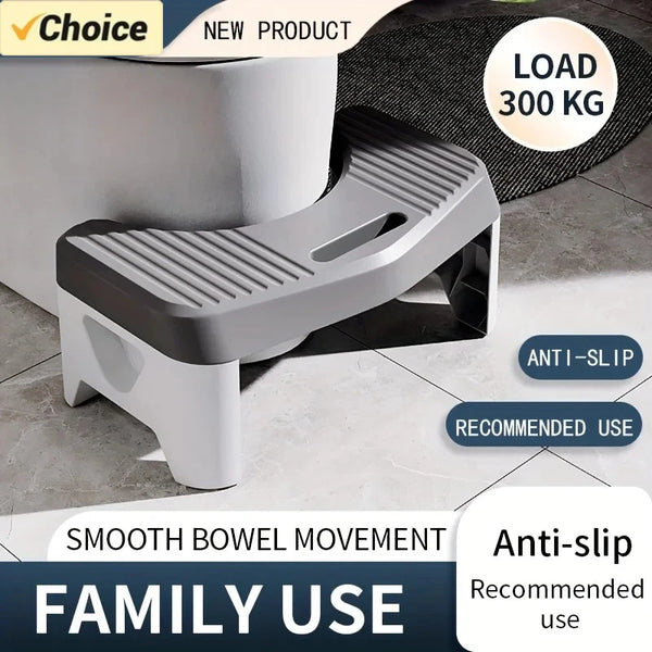 A gray ergonomic toilet footstool with ribbed treads is shown next to a white toilet, designed for smooth bowel movement and 