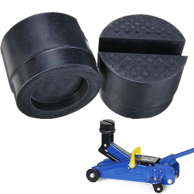 Ein Set schwarzer Gummi-Aufstützpads und ein blauer Autheber.