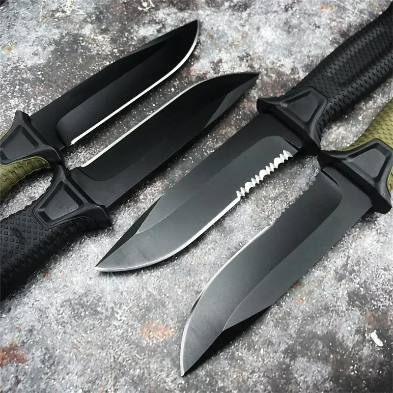 A set of black full tang fixed blade knives with textured handles resting on a gray surface.