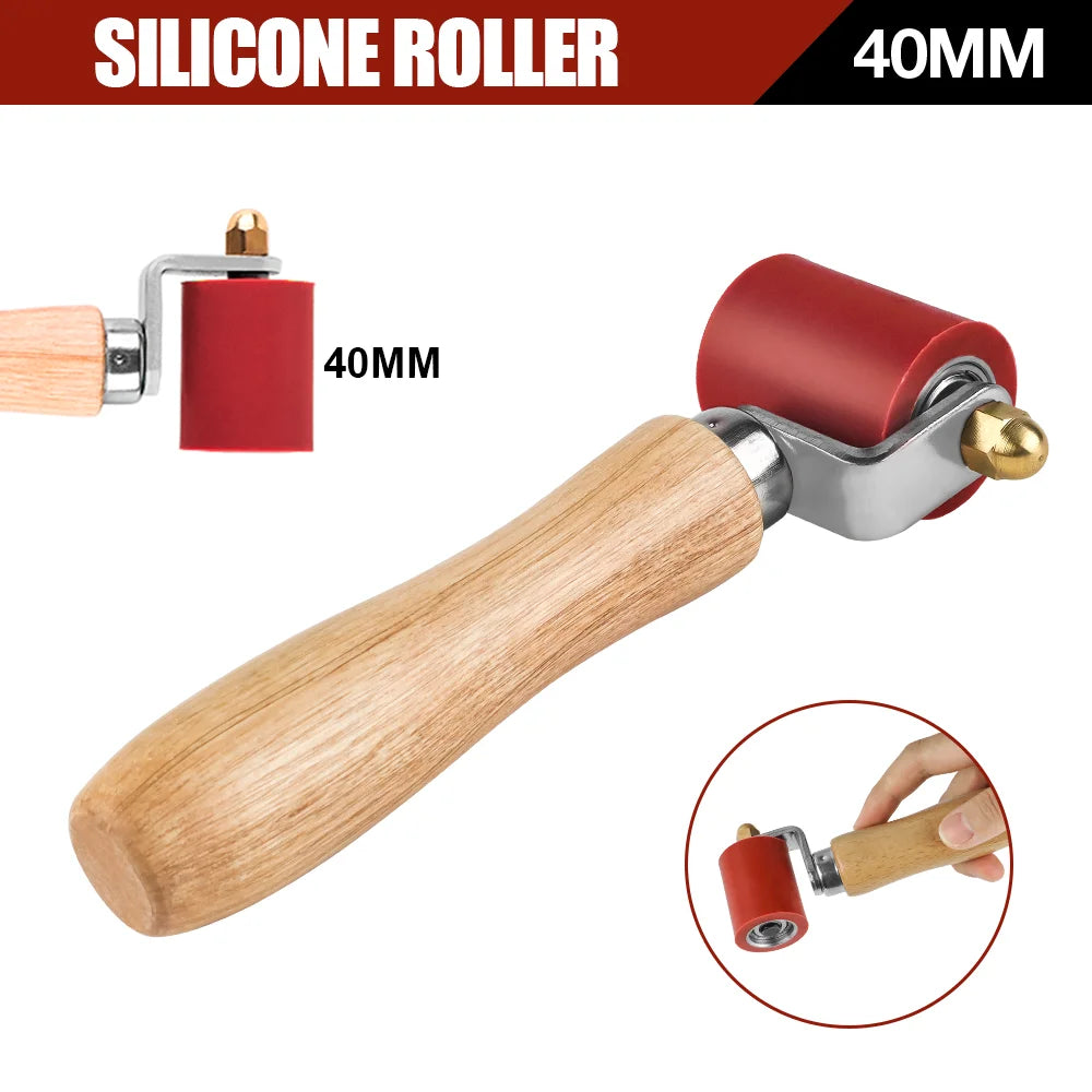 A wooden handle silicone roller tool with a red roller and brass fitting, shown in various views.