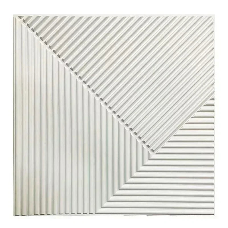 A close-up view of white, vertically ribbed 3D diamond PVC wall panels.