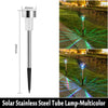 Solar stainless steel tube lamp multicolor garden path light illuminating a green lawn