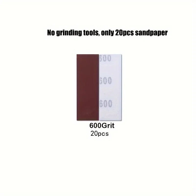 Two pieces of 600 grit sandpaper, one brown and one white, for surface smoothing.